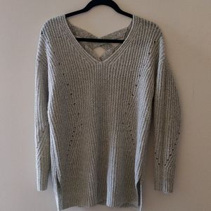 Light green tunic sweater with criss-cross back